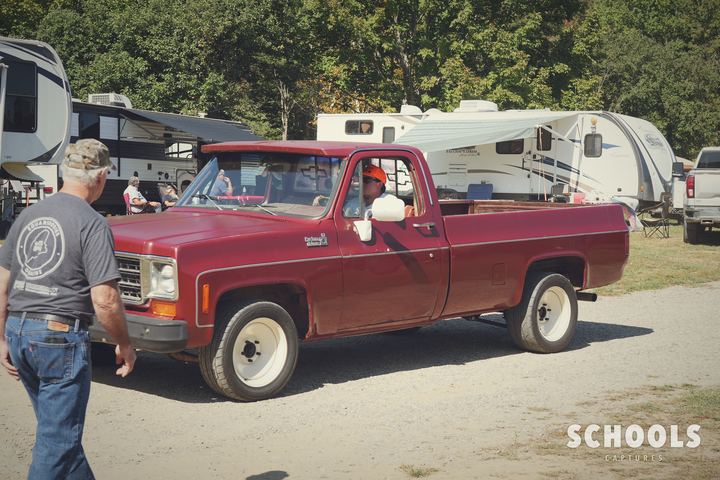 Maroon square body with owner